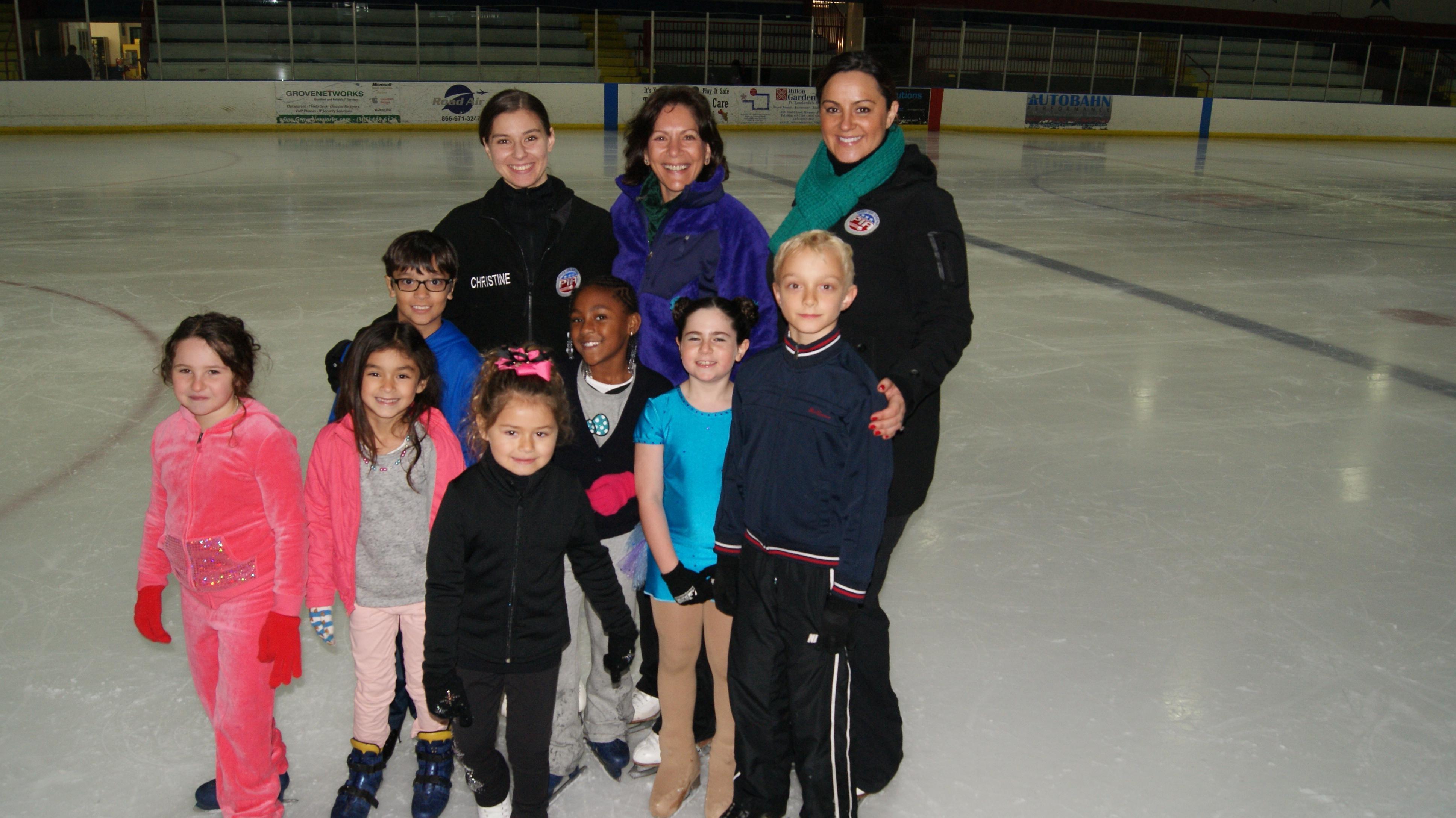Kids on a field trip at an ice skating arena